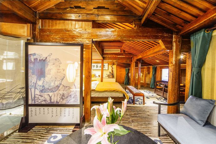 Imagen de los interiores del Hotel Lijiang Wengjia Dayuan. Foto 20
