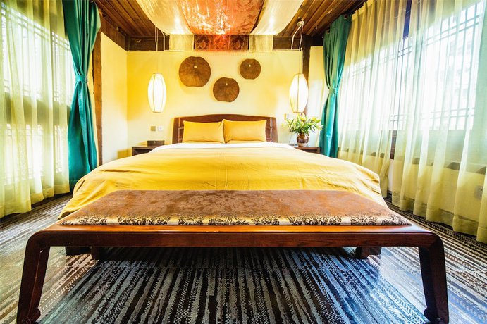 Imagen de la habitación del Hotel Lijiang Wengjia Dayuan. Foto 9