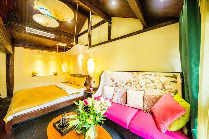 Imagen de la habitación del Hotel Lijiang Wengjia Dayuan. Foto 10