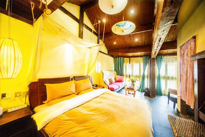 Imagen de la habitación del Hotel Lijiang Wengjia Dayuan. Foto 11