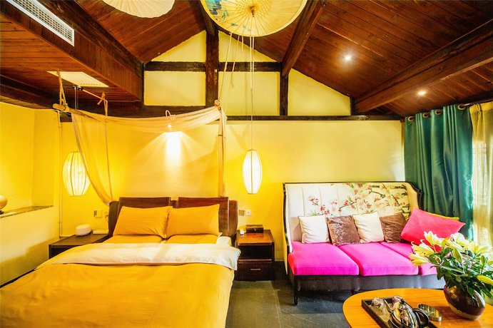 Imagen de la habitación del Hotel Lijiang Wengjia Dayuan. Foto 12