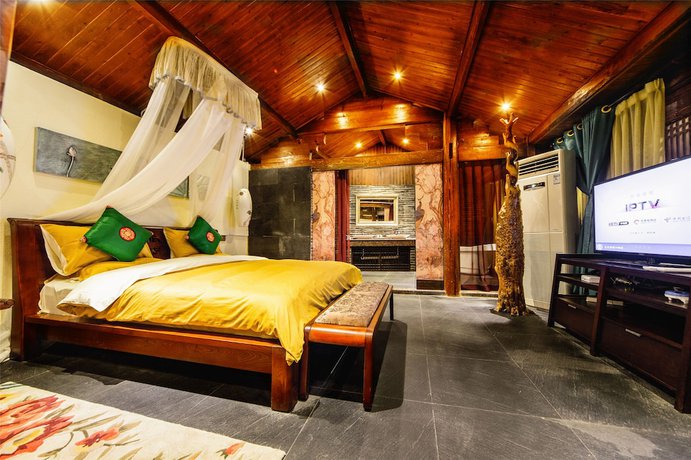 Imagen de la habitación del Hotel Lijiang Wengjia Dayuan. Foto 14