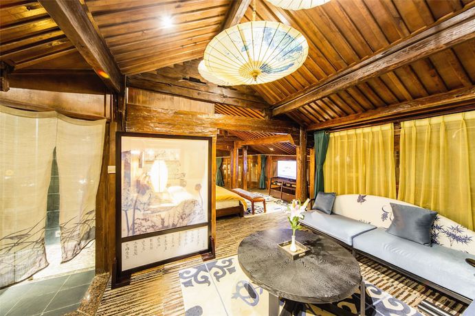 Imagen de la habitación del Hotel Lijiang Wengjia Dayuan. Foto 15
