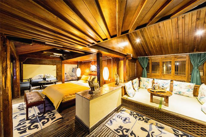 Imagen de la habitación del Hotel Lijiang Wengjia Dayuan. Foto 16