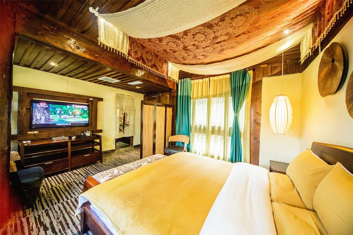 Imagen de la habitación del Hotel Lijiang Wengjia Dayuan. Foto 19