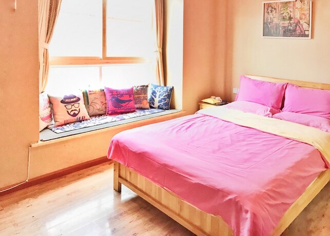 Imagen de la habitación del Hotel Lijiang X.ann Blossom inn. Foto 11