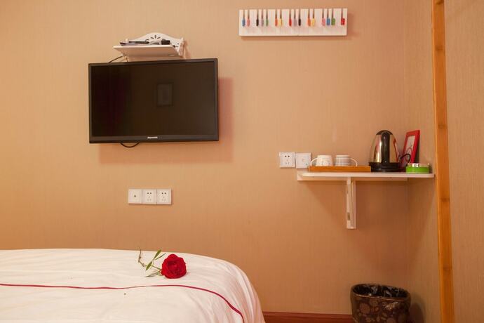 Imagen de la habitación del Hotel Lijiang X.ann Blossom inn. Foto 12