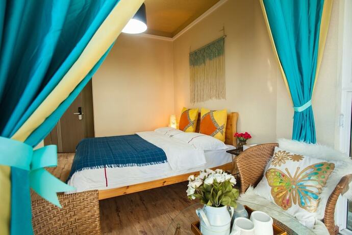 Imagen de la habitación del Hotel Lijiang X.ann Blossom inn. Foto 14