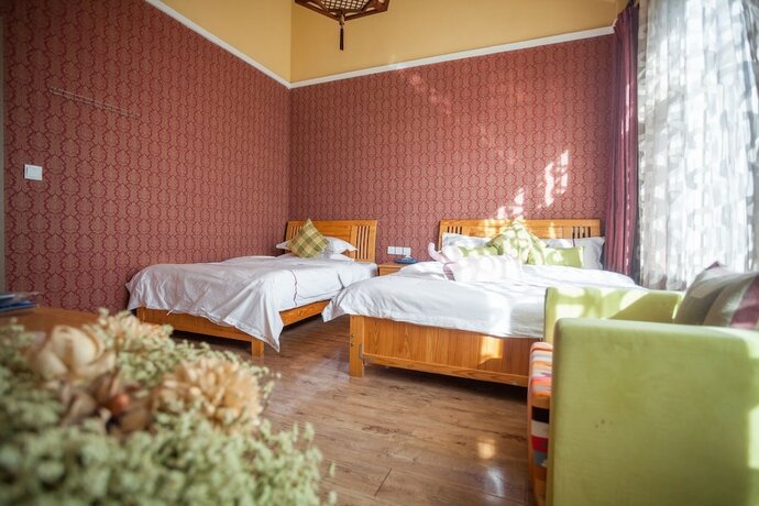 Imagen de la habitación del Hotel Lijiang X.ann Blossom inn. Foto 16