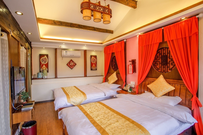 Imagen de la habitación del Hotel Lijiang Xueshanyu Inn. Foto 8