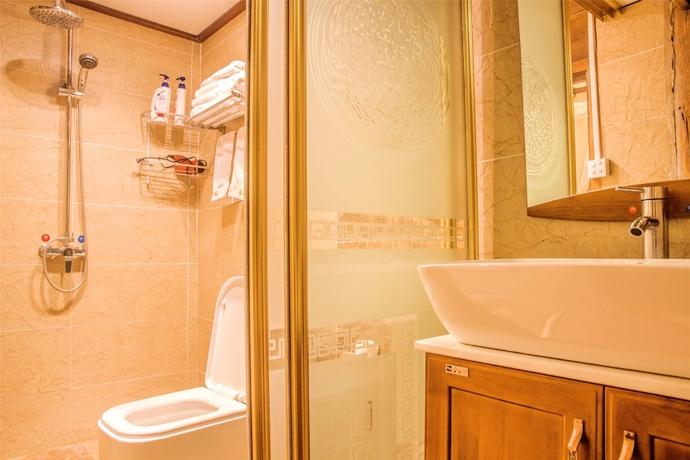 Imagen de la habitación del Hotel Lijiang Xueshanyu Inn. Foto 12