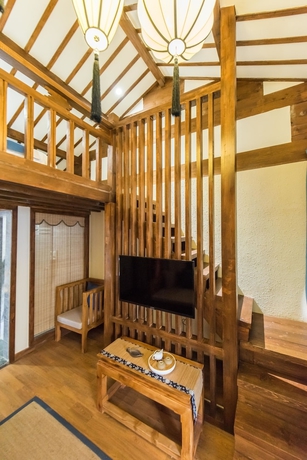 Imagen de la habitación del Hotel Lijiang Yue Tu Inn. Foto 3