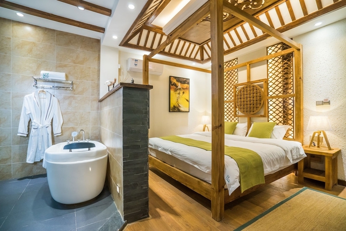 Imagen de la habitación del Hotel Lijiang Yue Tu Inn. Foto 4