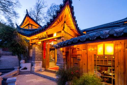Imagen de la habitación del Hotel Lijiang Zen Garden. Foto 2