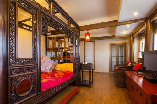 Imagen de la habitación del Hotel Lijiang Zen Garden. Foto 5