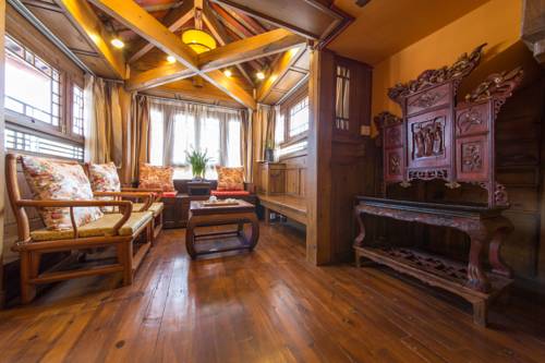 Imagen de la habitación del Hotel Lijiang Zen Garden. Foto 13