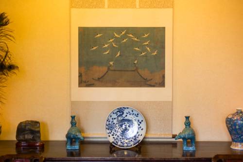 Imagen de la habitación del Hotel Lijiang Zen Garden. Foto 16