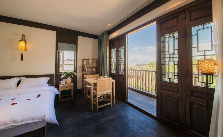 Imagen de la habitación del Hotel Lijiang Zhuyun Boutique. Foto 5