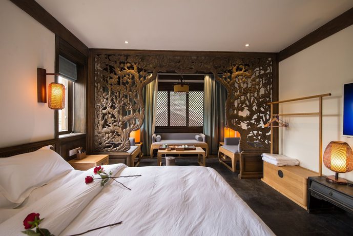 Imagen de la habitación del Hotel Lijiang Zhuyun Boutique. Foto 6