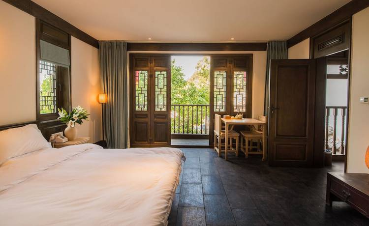 Imagen de la habitación del Hotel Lijiang Zhuyun Boutique. Foto 8