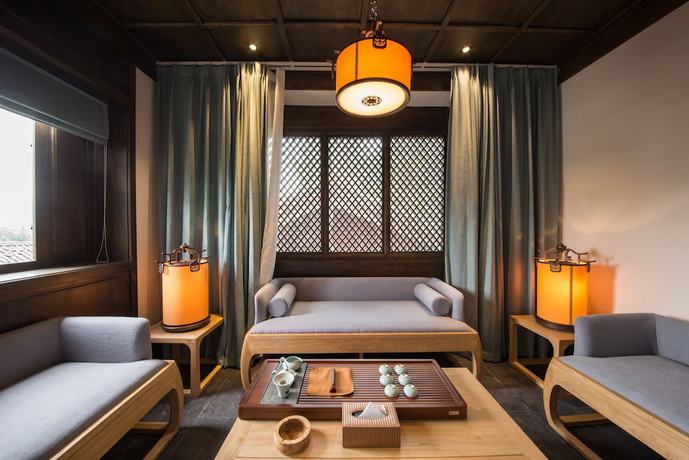 Imagen de la habitación del Hotel Lijiang Zhuyun Boutique. Foto 10
