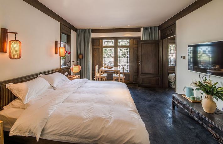 Imagen de la habitación del Hotel Lijiang Zhuyun Boutique. Foto 14