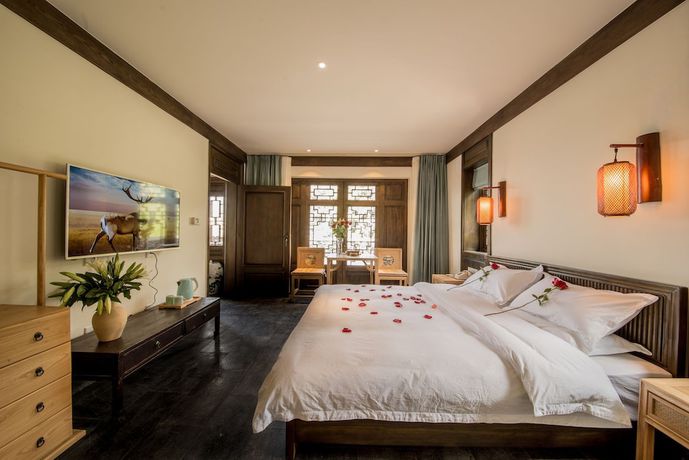 Imagen de la habitación del Hotel Lijiang Zhuyun Boutique. Foto 15