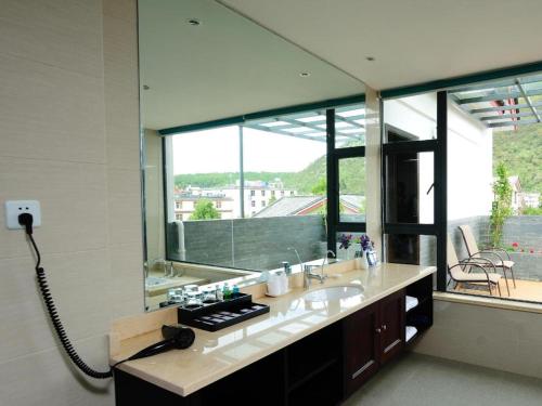 Imagen general del Hotel Lijiang Ziyue. Foto 14