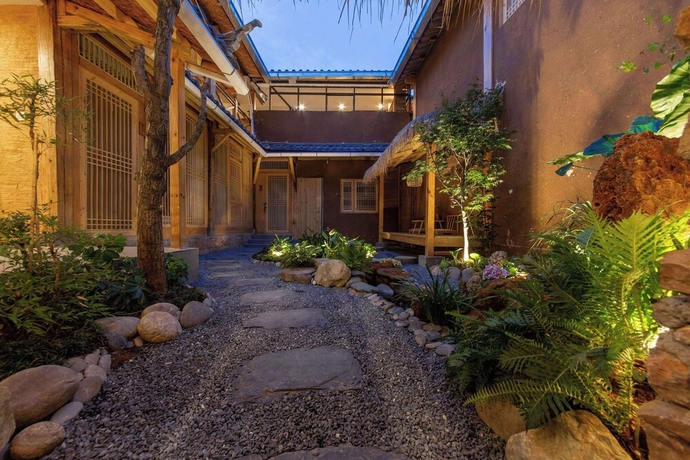 Imagen de la habitación del Hotel Lijiang half yard hotel. Foto 8
