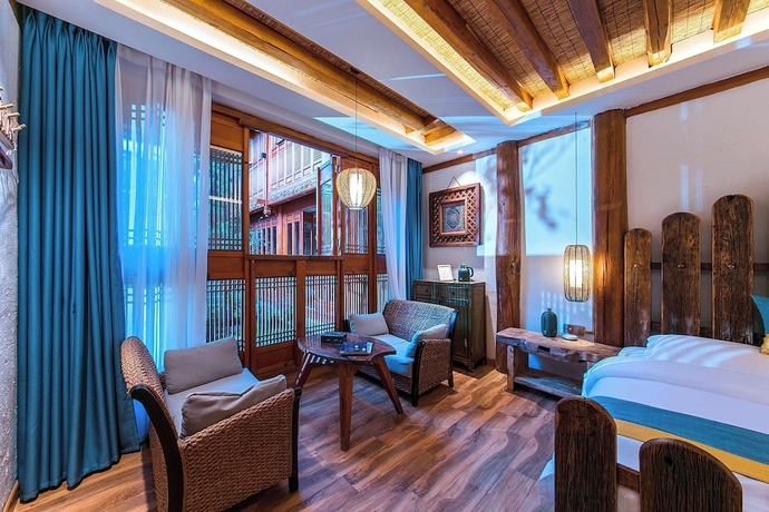 Imagen de la habitación del Hotel Lijiang half yard hotel. Foto 11