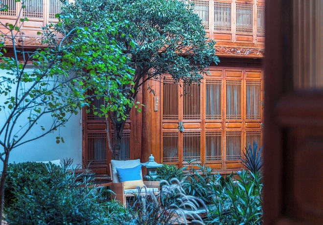 Imagen de los interiores del Hotel Lijiang half yard hotel. Foto 13