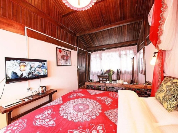 Imagen de la habitación del Hotel Lijiang shuimuxiquan Inn. Foto 2