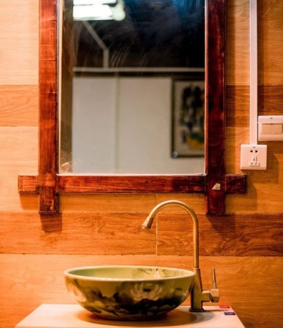 Imagen de la habitación del Hotel Lijiang shuimuxiquan Inn. Foto 3