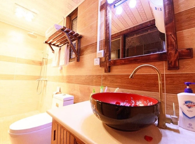 Imagen de la habitación del Hotel Lijiang shuimuxiquan Inn. Foto 4
