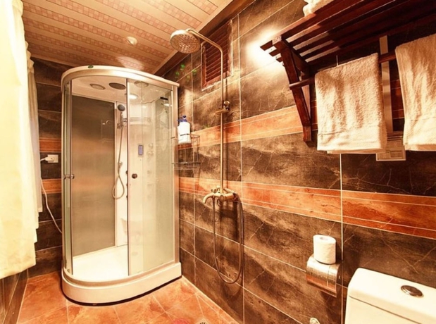 Imagen de la habitación del Hotel Lijiang shuimuxiquan Inn. Foto 5