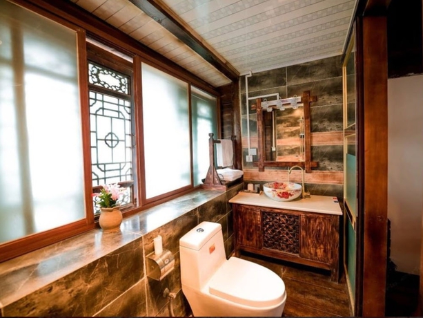 Imagen de la habitación del Hotel Lijiang shuimuxiquan Inn. Foto 6