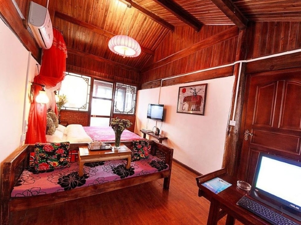 Imagen de la habitación del Hotel Lijiang shuimuxiquan Inn. Foto 8