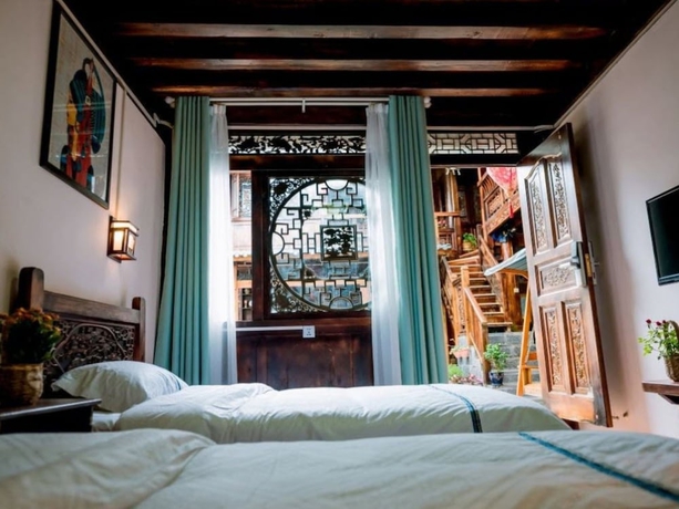 Imagen de la habitación del Hotel Lijiang shuimuxiquan Inn. Foto 10