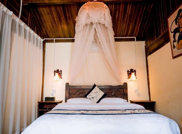 Imagen de la habitación del Hotel Lijiang shuimuxiquan Inn. Foto 15