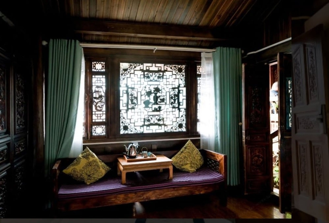 Imagen de la habitación del Hotel Lijiang shuimuxiquan Inn. Foto 19