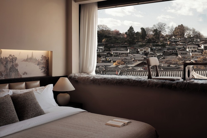 Imagen de la habitación del Hotel Lijing Yunman Mushanxue lnn. Foto 2