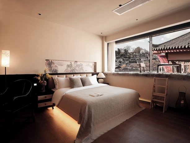 Imagen de la habitación del Hotel Lijing Yunman Mushanxue lnn. Foto 3