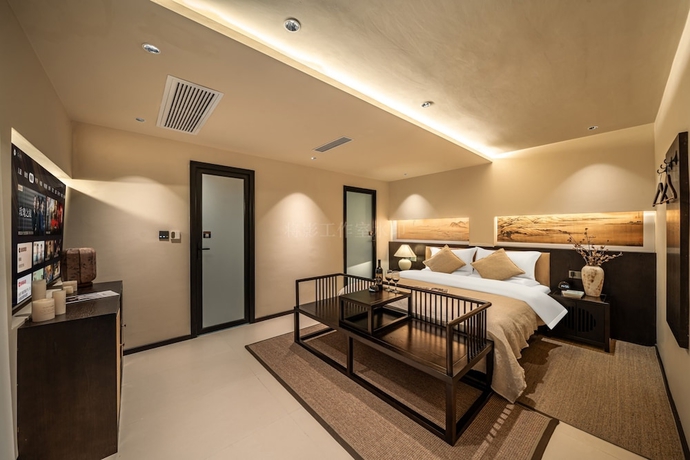Imagen de la habitación del Hotel Lijing Yunman Mushanxue lnn. Foto 4