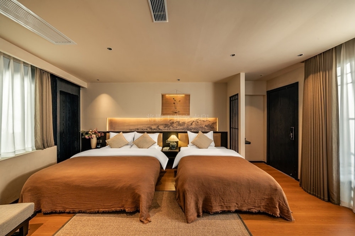 Imagen de la habitación del Hotel Lijing Yunman Mushanxue lnn. Foto 7