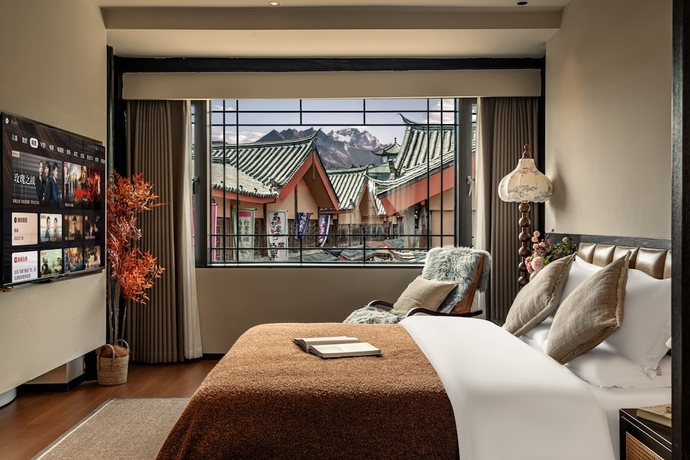 Imagen de la habitación del Hotel Lijing Yunman Mushanxue lnn. Foto 8