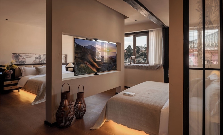 Imagen de la habitación del Hotel Lijing Yunman Mushanxue lnn. Foto 13