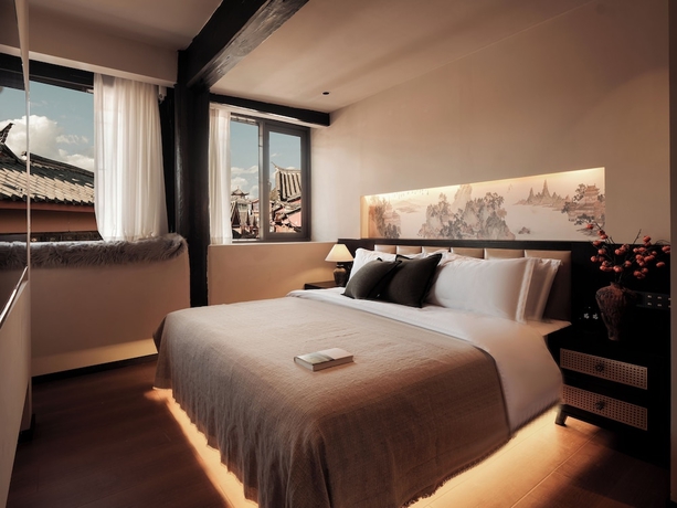Imagen de la habitación del Hotel Lijing Yunman Mushanxue lnn. Foto 14