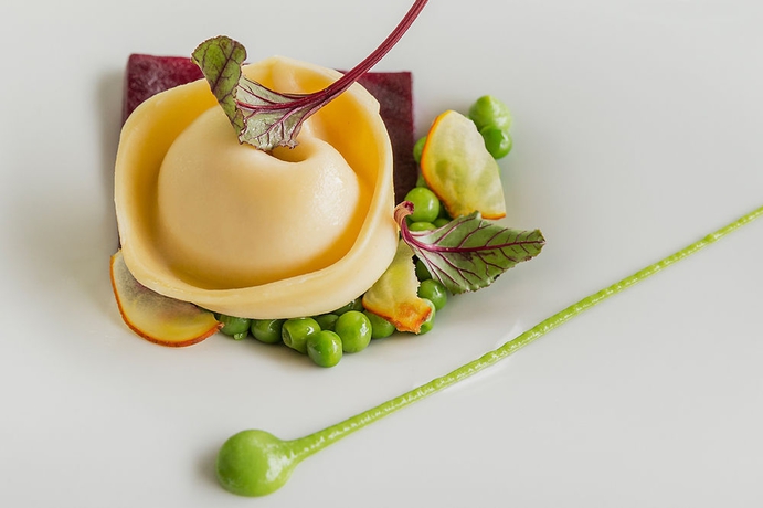 Imagen del bar/restaurante del Hotel Likuliku Lagoon Resort - Adults Only. Foto 4