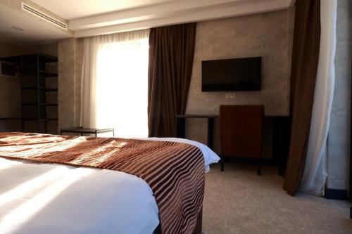 Imagen de la habitación del Hotel Lilat. Foto 18