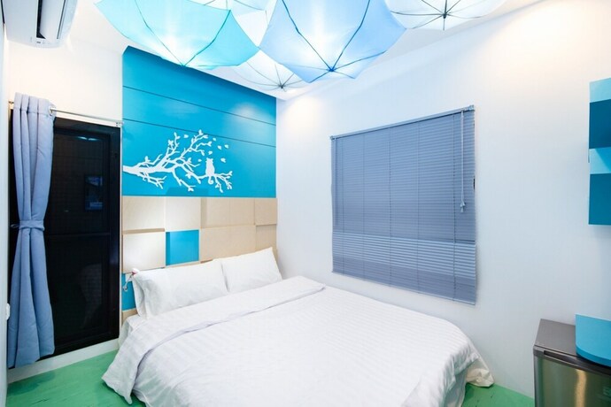 Imagen de la habitación del Hotel Lilliput Riverside Bangkachao. Foto 22